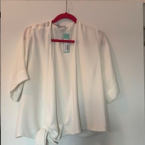 White wrap blouse. NWT